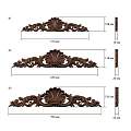 Artistic Dark Wood Carvings Showcasing Intricate Shell Shapes And Scrollwork Patterns