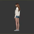 A woman wearing white long-sleeve top blue denim shorts light blue shoes against gray background