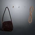 Brown Fabric Bag With Wall Hooks And Braided Rope As Practical Household Items 3d model