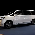 White MPV Car With Sleek Exterior Design And Modern Alloy Wheels