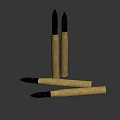 Brass Artillery Shells With Black Warheads And Red Markings On Dark Background