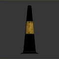 Black And Yellow Striped Traffic Cone With Base Mat On Gray Background