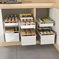 Modern Kitchen Cabinet Storage Rack With Multiple Drawers And Organized Glass Jars And Food Containers