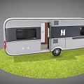 Silver Gray Caravan Parked on Green Grass with Open Door Windows and M Logo