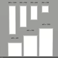 White Picture Frames in Various Sizes Displayed on Wall Surface