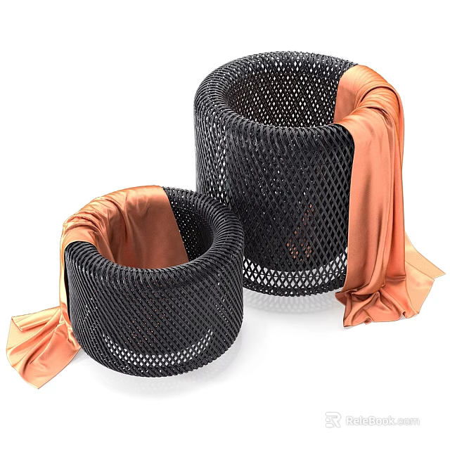 Two Black Woven Circular Hanging Decorations With Orange Fabric Accents 3d model 
