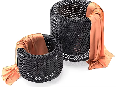 Two Black Woven Circular Hanging Decorations With Orange Fabric Accents 3d model