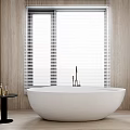 White Freestanding Oval Bathtub in Bathroom with Wooden Walls Window Blinds and Side Table