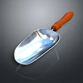 Shiny Metal Scoop Daily Life Product With Wooden Textured Handle And Smooth Surface