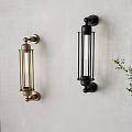 Modern Gold And Black Wall Lamps Mounted On Light Gray Wall With Green Foliage
