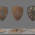 Medieval Wooden Shields With Metal Accents And Ornate Designs On