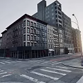 Downtown Commercial Street Featuring Classical Red Buildings Gray Storefronts Street Lamps and Crosswalks