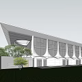Modern Large Building With White Exterior Curved Windows Sloped Roof And Trees Around