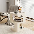 Modern White Coffee Table With Layered Design Mug Rabbit Figurine Books And Magazines