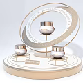 TIRTOSH Art Installation With Golden Circular Structure Engraved Text And Three Silver Containers