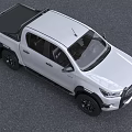Toyota White Pickup Truck With Black Wheels And Front Grille Design