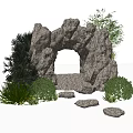 Decorative Garden Ornament With Rock Archway Surrounding Green Plants And Stone Stepping Stones