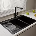Kitchen Sink With Double Bowl And Black Faucet On White Countertop With Apples And Blinds