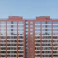Aerial Planning High Rise Residential Building Red Brick Exterior Glass Curtain Walls Blue Sky Greenery