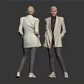 Modern Woman Wearing Light Colored Blazer Dark Turtleneck Jeans and White Shoes