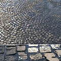 Durable Cobblestone Paving Components with Circular Patterns and Textured Surfaces