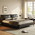 Modern Black Leather Double Bed With Light Colored Bedding Nightstand And Wall Art