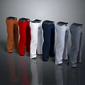 Various Colored Pants with Black Belts on Grey Smooth Surface
