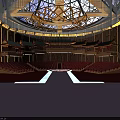Luxurious Theater Interior With Red Seats Stage Blue Circular Backdrop And Ornate Ceiling Decorations