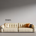 Designer Cream Sectional Sofa With Tufted Details And Orange Gray Cushions