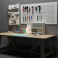 Wooden Craft Workbench With Pegboard Shelving And Colorful Tools Setup