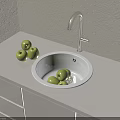 Modern White Washbasin with Silver Faucet on White Countertop Green Apples and White Cabinets