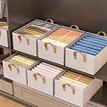 Gray Fabric Organizer Boxes With Gold Handles For Colorful Towel Storage