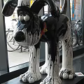 Art Installation Dog Shaped Sculpture With Dripping Paint Black White Red Accents