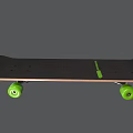 Black And Green Racing Skateboard With Splash Design And Green Wheels