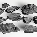 Natural Stone and Wood Pieces with Textured Surfaces and Various Shapes