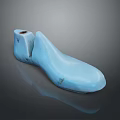 Light Blue Shoe Shaped Medical Device with Open Design and Internal Structure 3d model