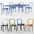 Modern Dining Table Set With Multi Colored Chairs And Oval Design 3d model