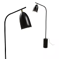 Modern Black Floor Lamp With Curved Pole And Bell Shaped Shade Design
