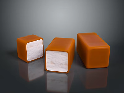 Three Square Caramel Colored Candies With White Filling On Dark Surface 3d model