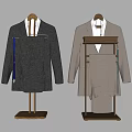 Classic Gray And Beige Men's Suits Displayed On Wooden Hangers With Details