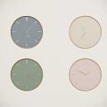 Four Decorative Wall Mounted Clocks in Different Colors for Home Decor