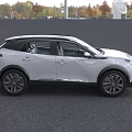 White Peugeot SUV With Modern Headlights And Grille On Street
