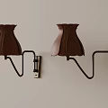 Modern Wall Sconces With Wooden Shades And Metal Brackets Mounted On Wall