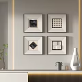Framed Abstract Paintings As Wall Decor In Modern Home Interior With Vase And Accessories