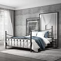 Black Metal Double Bed With Curved Railings White Sheets Blue Blanket Mirror And Nightstand