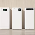 Three White Daily Air Purifiers On Wooden Floor Against Wall With Top Displays Showing Readings