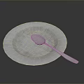 Blue Plate With Decorative Edge And Silver Spoon For Daily Household Use