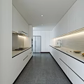 Modern Kitchen Interior With White Cabinets Light Countertops Appliances And Natural Lighting