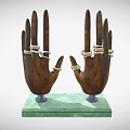 Colorful Gemstone Jewelry Rings Displayed On Wooden Hand Models With Green Base