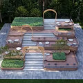 Outdoor Wooden Staircase with Greenery Platforms Round Tables and Palm Trees